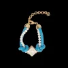 Blue Knotted Pearl Bracelet